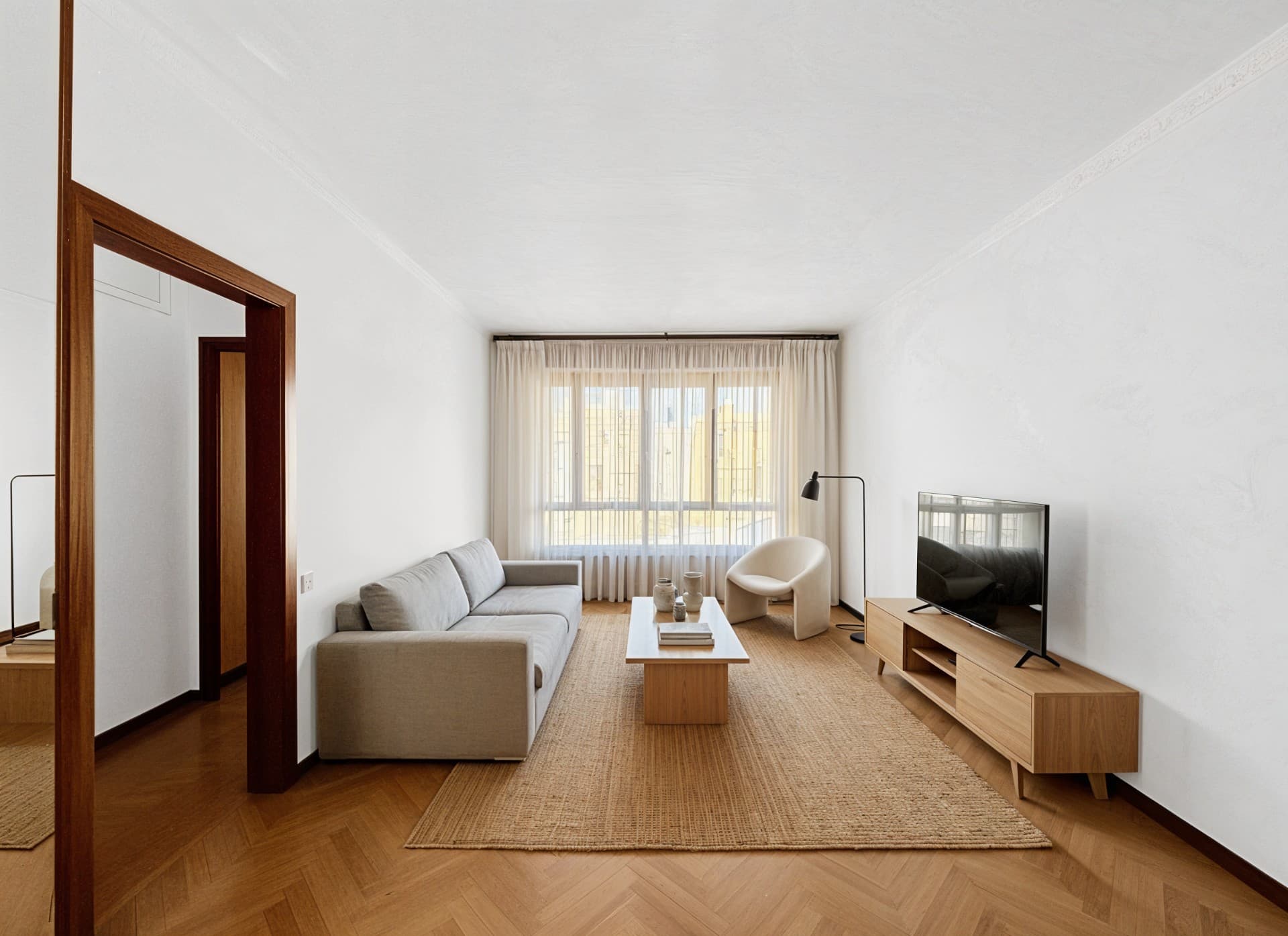 Photo of a furnished living room after virtual home staging edited with Inmoedit