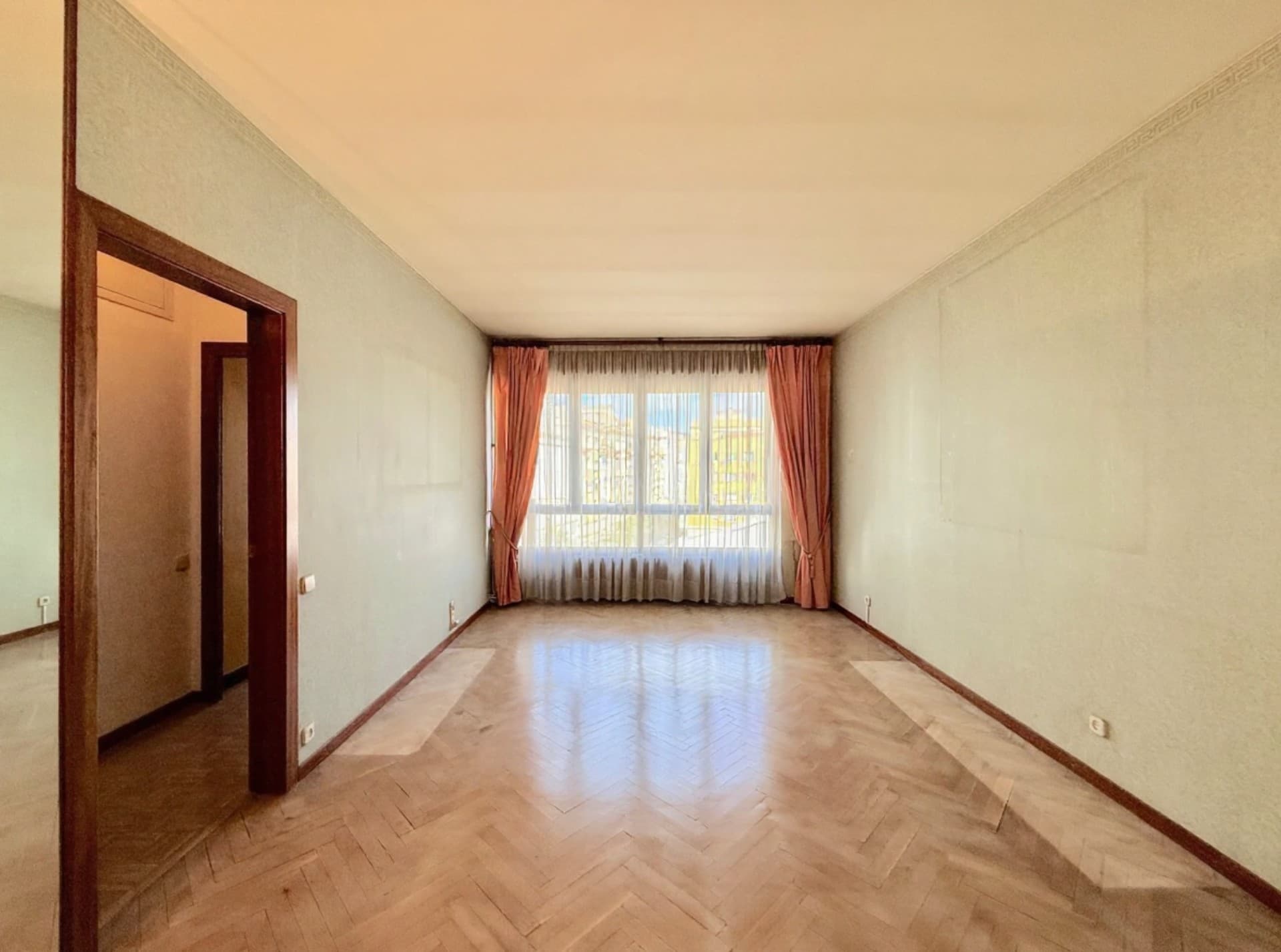 Photo of a living room without furniture before virtual home staging