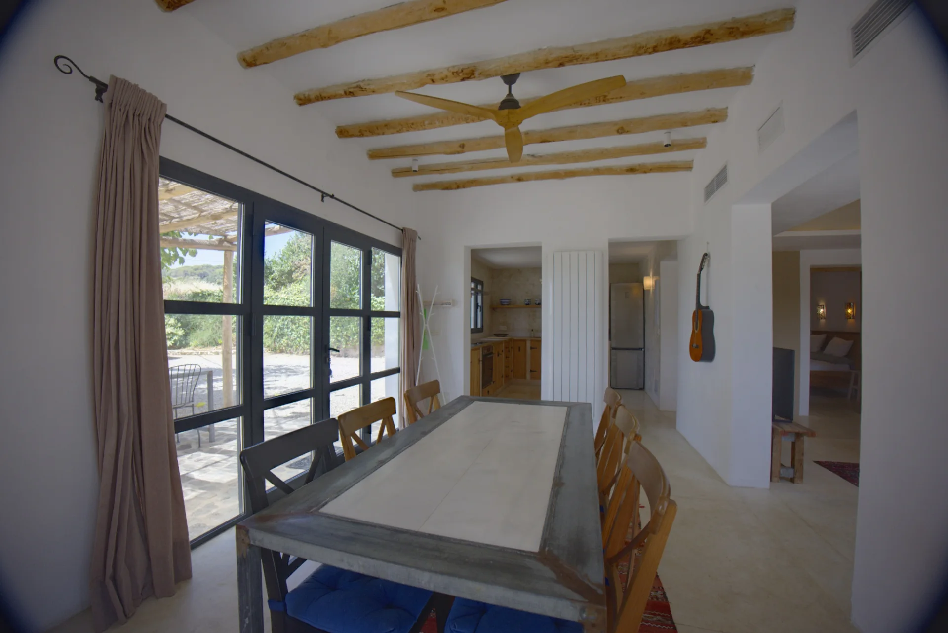 Photo of a dining room with perspective and wide-angle distortion