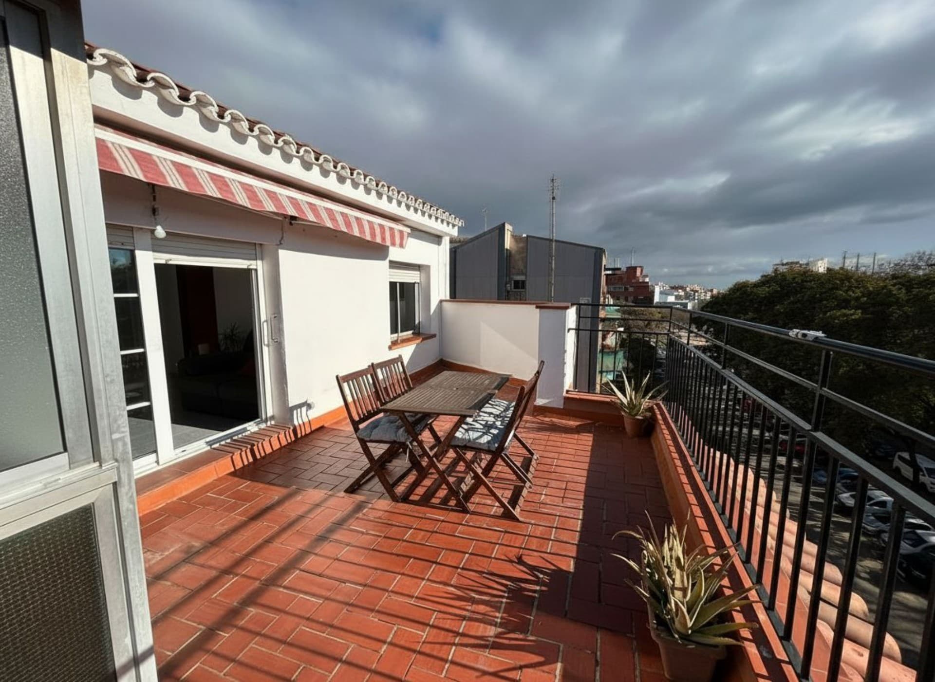 Exterior photo with a cloudy sky