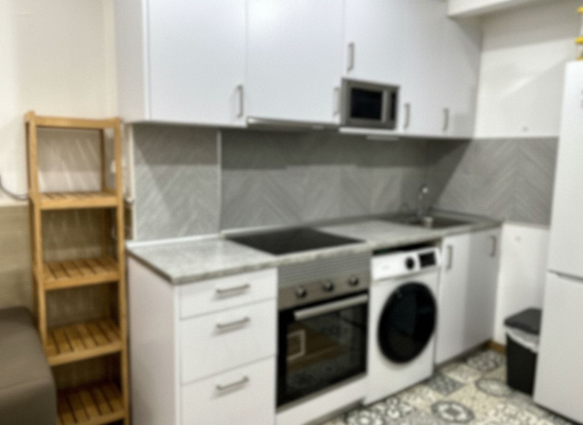 Low-resolution photo of a kitchen
